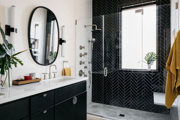 Modern black and white tile bathroom with zero-entry shower