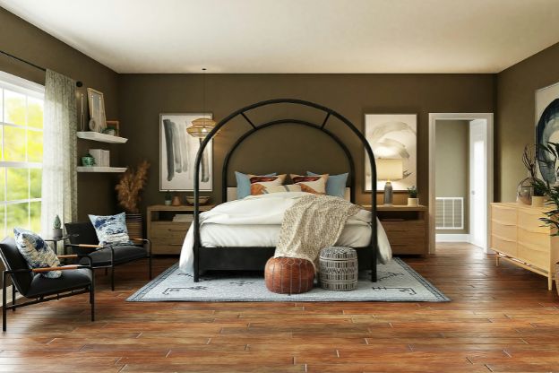 Brown painted bedroom with large window, black bed, and artwork on the walls.