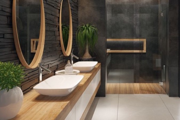 Modern black and wood bathroom with two basin sinks and a shower. 